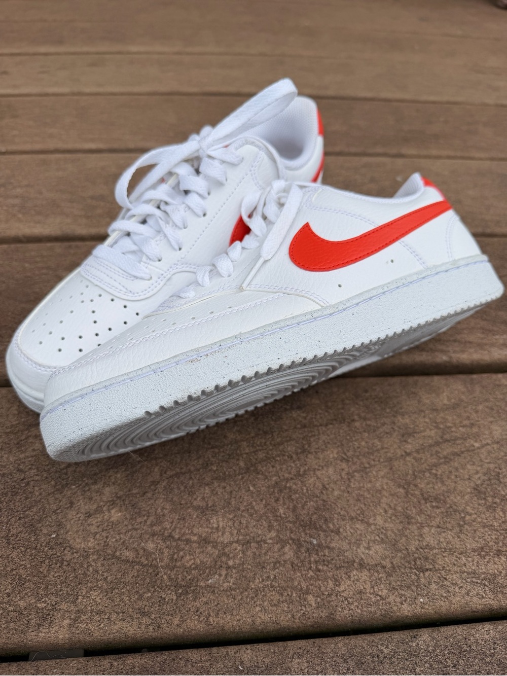 Women’s Nike White Sneakers with Bright Orange Swoosh
